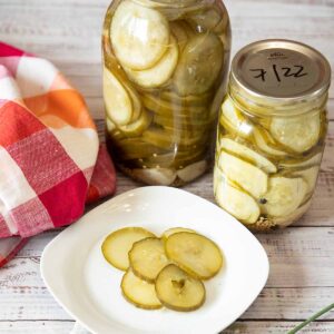 Dill Pickle Slices in jar and on plate