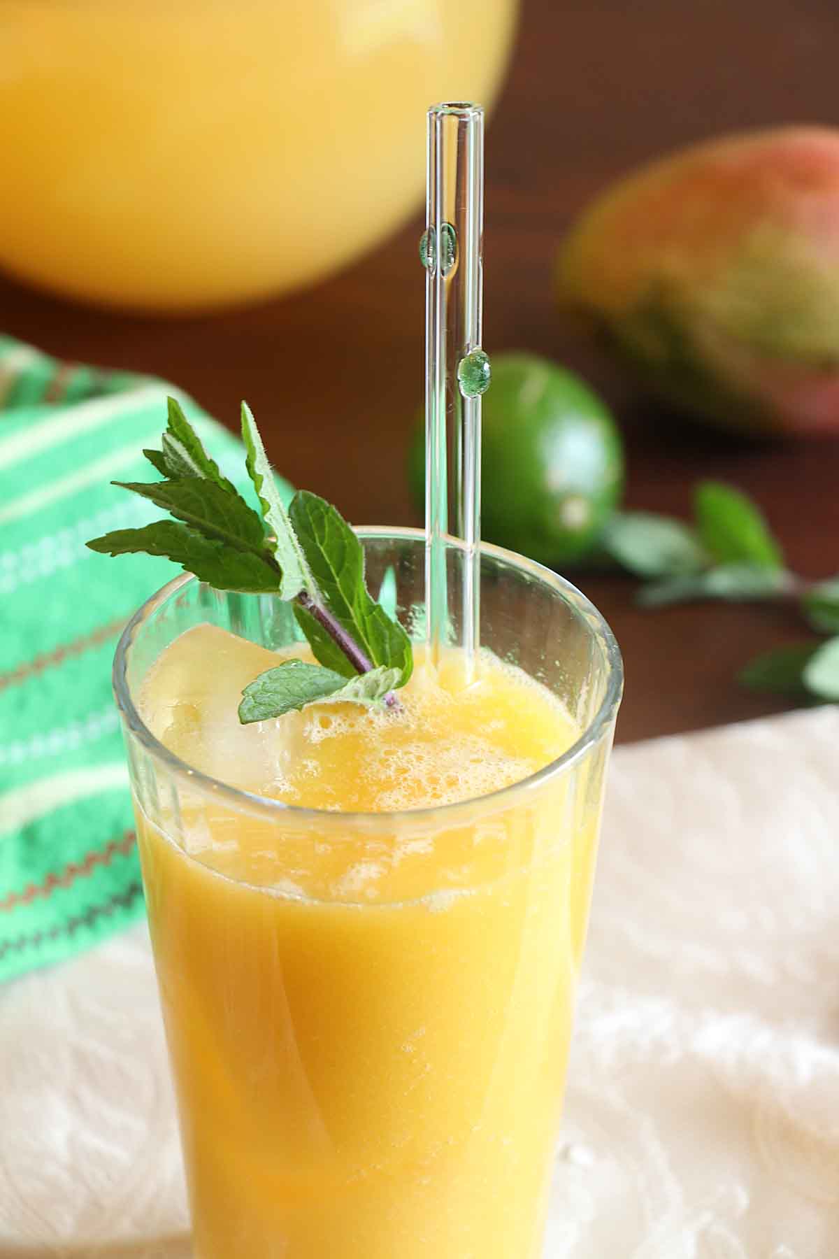 mango agua fresca with glass straw 