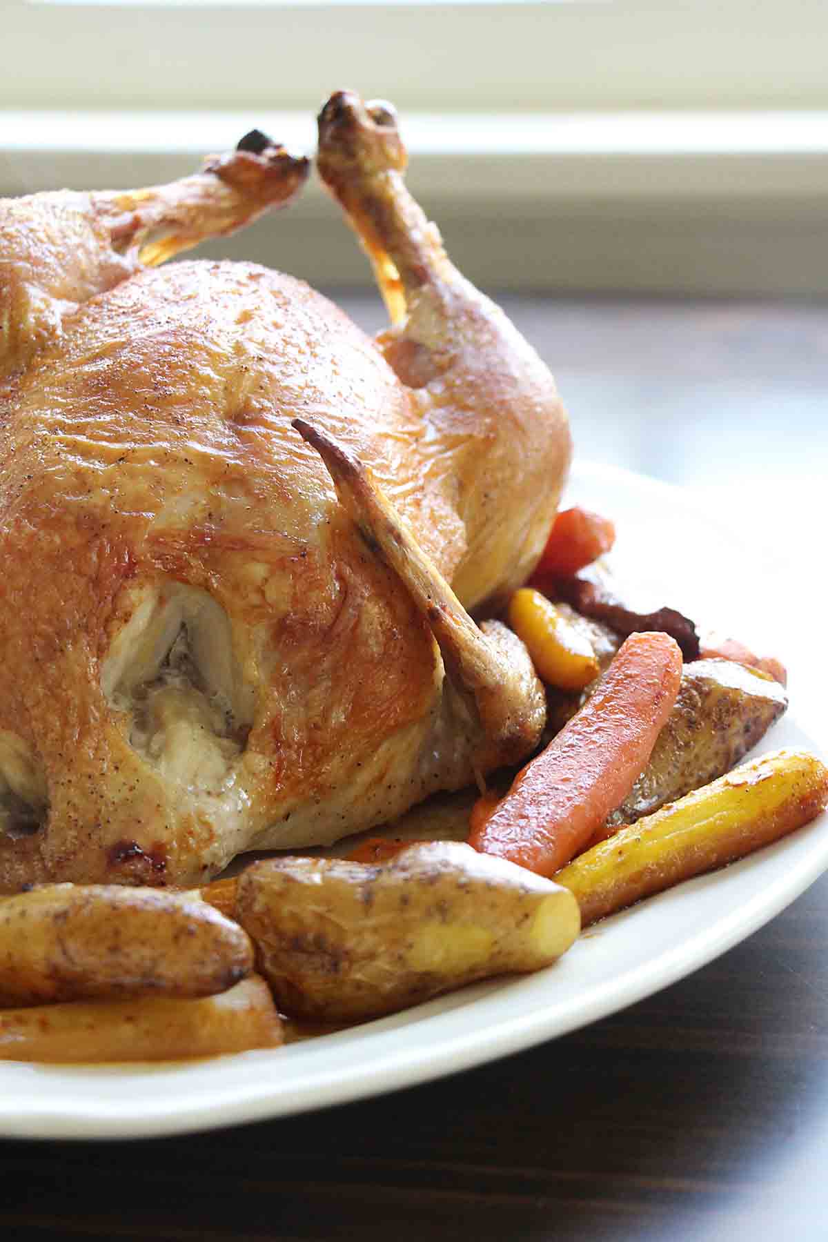 Dutch Oven Whole Chicken with Potatoes and Carrots - Savor the Best