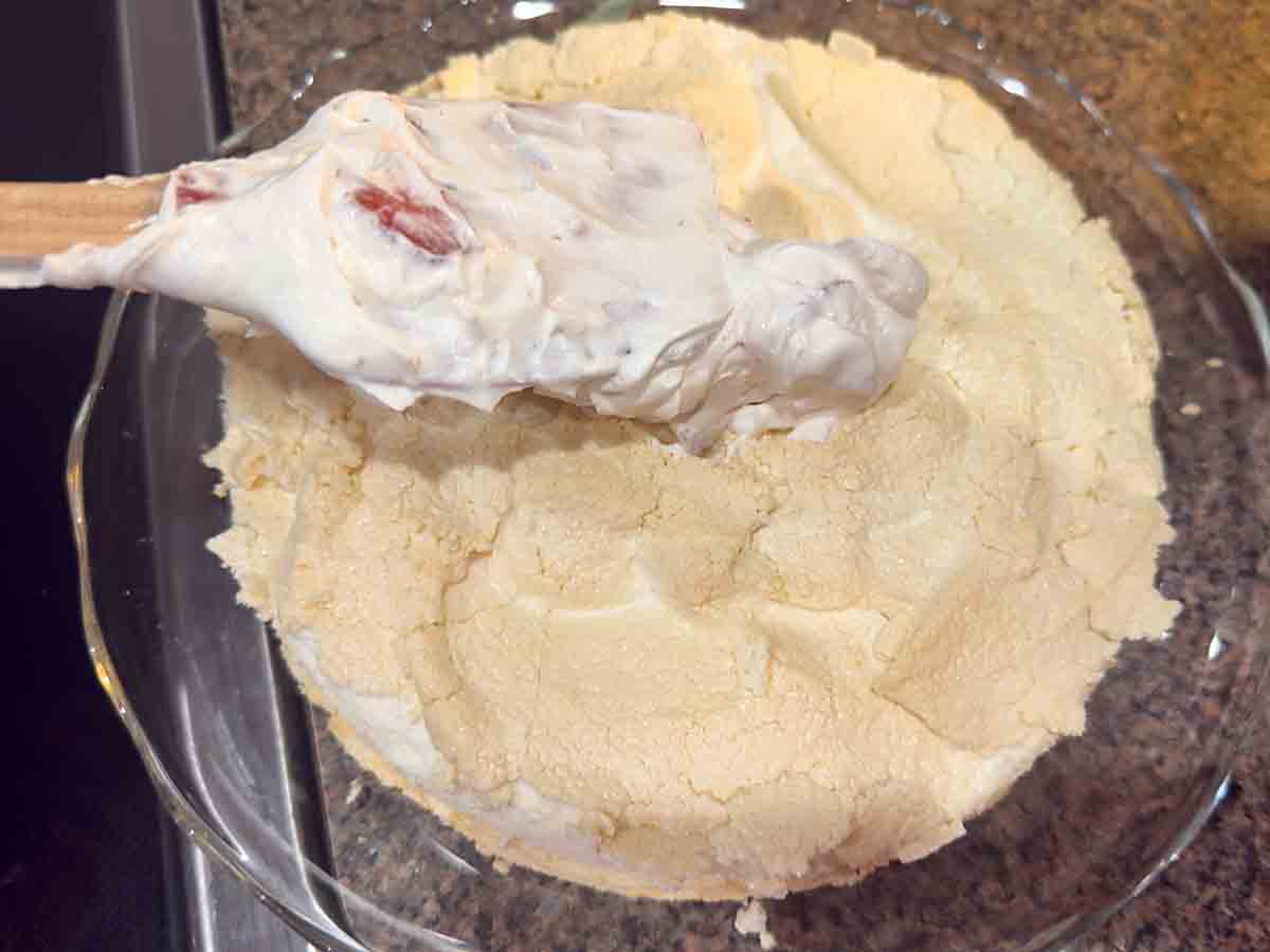 top first layer with whipped cream mixture