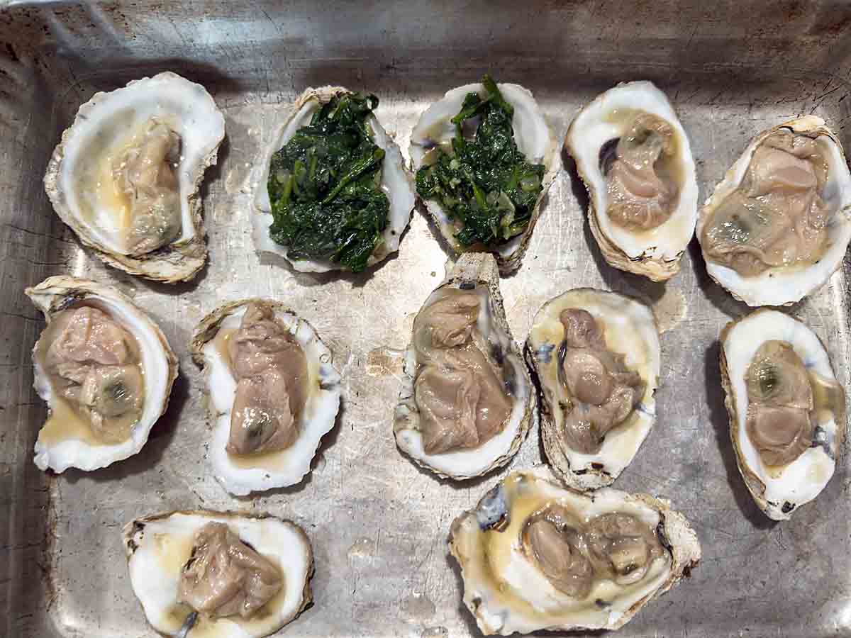 set shells in pan and top with oysters, then spinach mixture