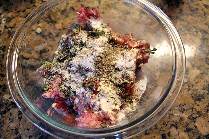Mix meat and spices for homemade Italian Sausage Sandwiches