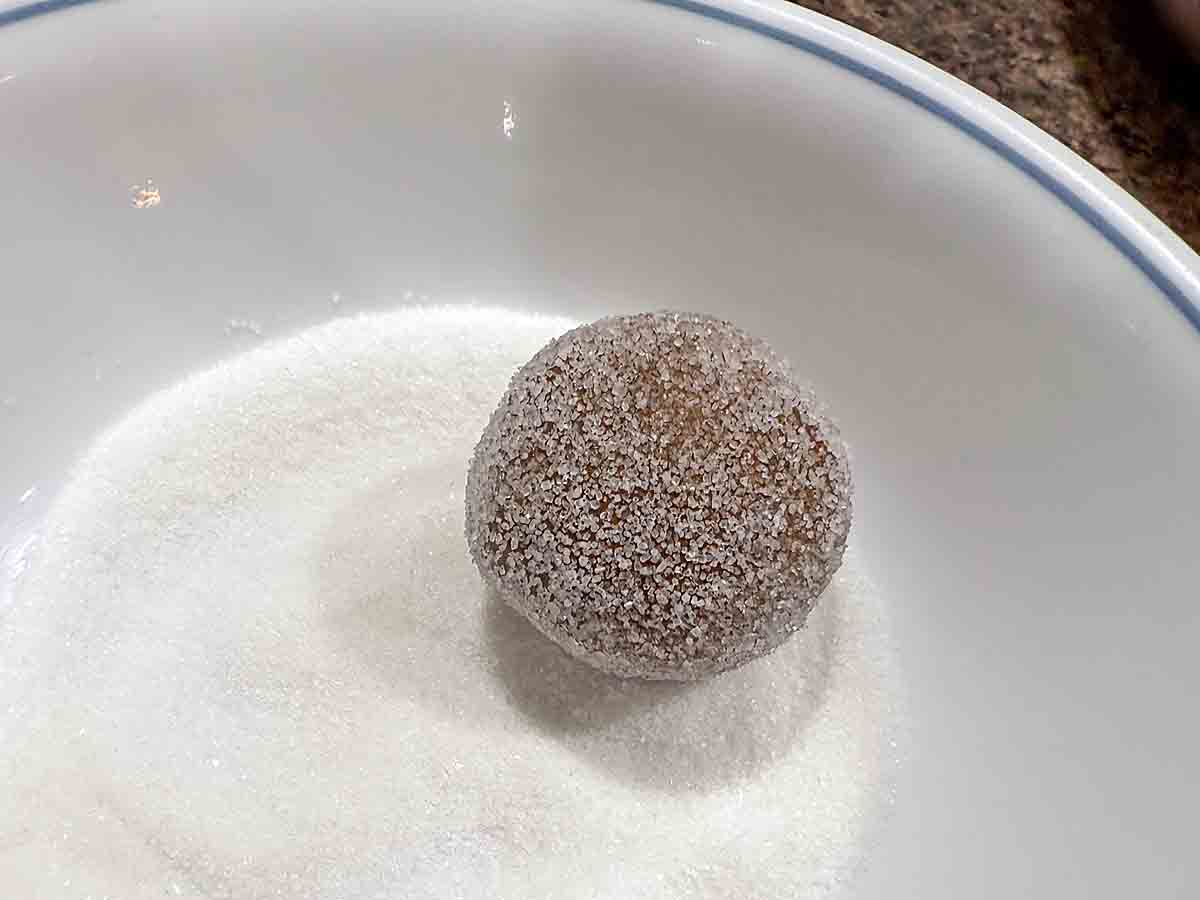 roll dough ball in sugar