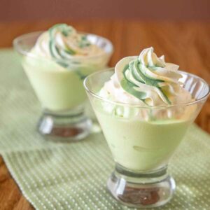 Creamy, cool and minty, with just the right hint of booze, the Frozen Grasshopper Ice Cream Drink is a tasty cocktail or dessert drink.