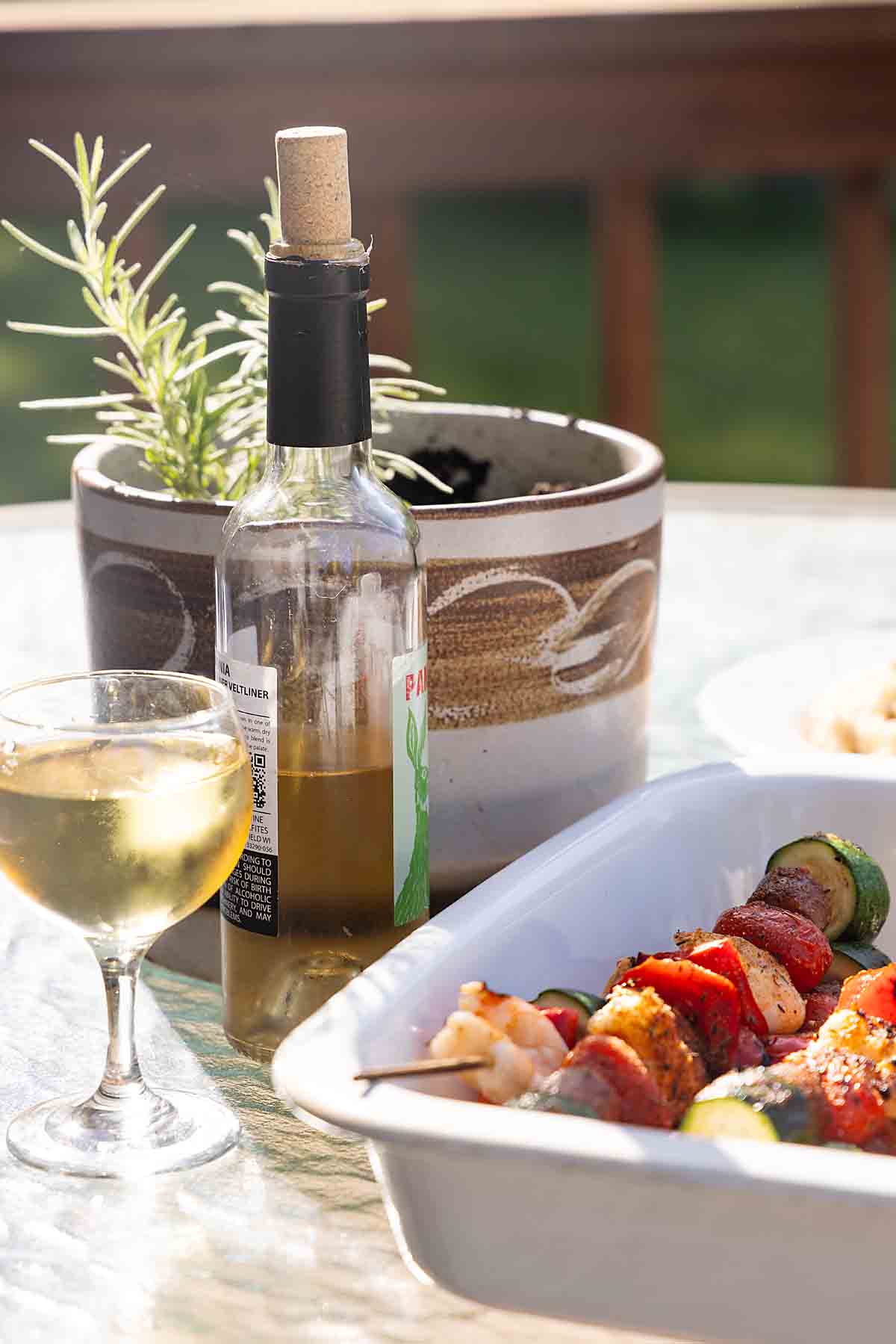 food and wine on outdoor table