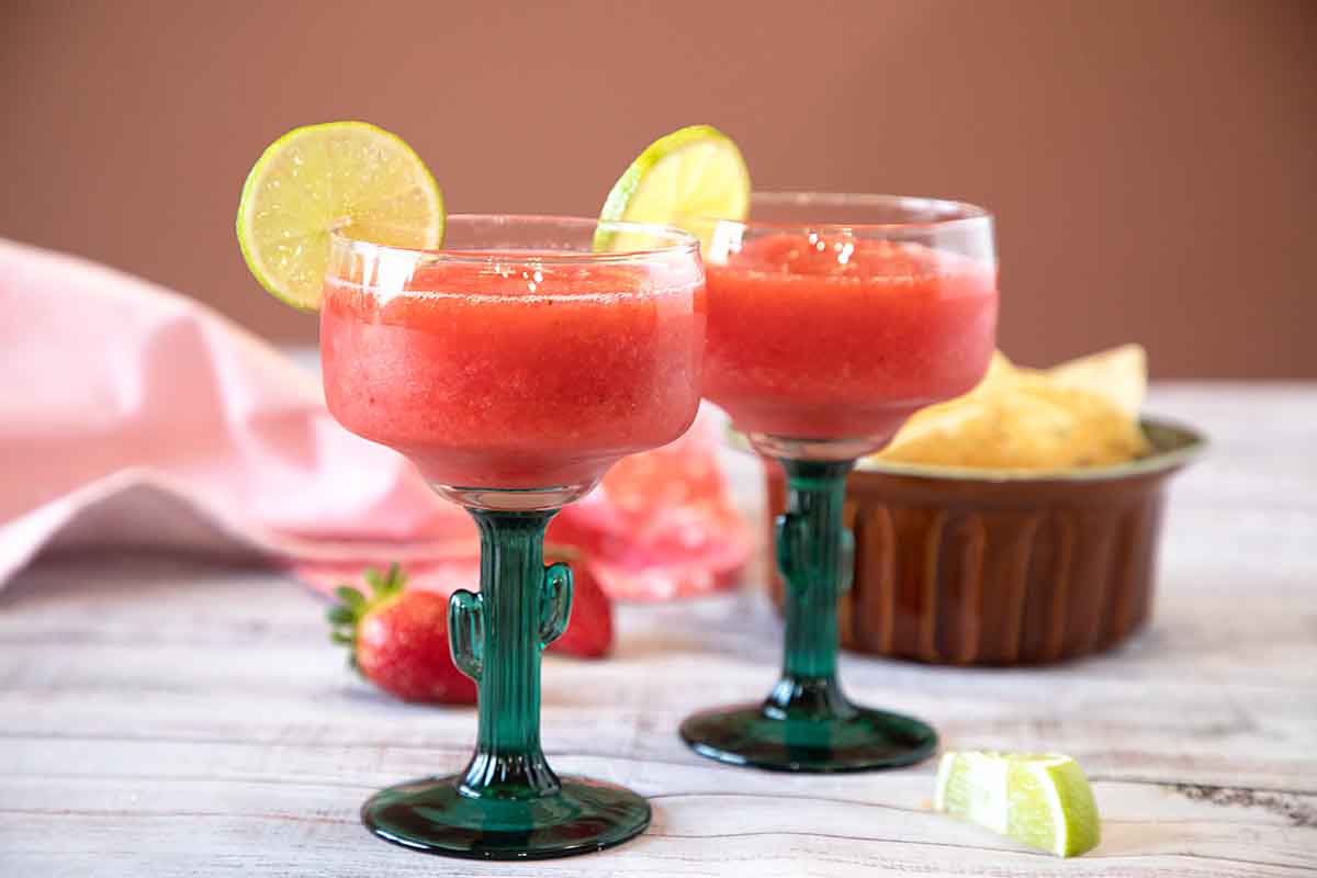 Is there anything more refreshing than a Frozen Strawberry Margaritas  A sweet, fruity cocktail that's also good as a Virgin Margarita!