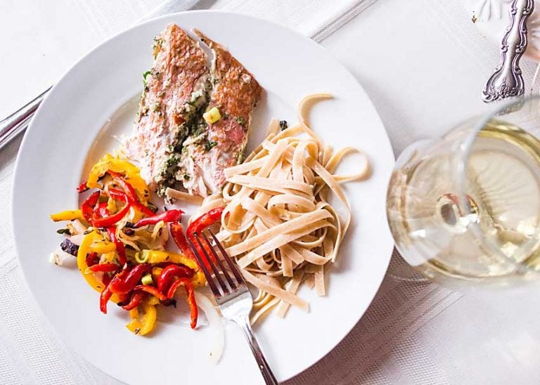 Grilled Whole Red Snapper is a tender mild fish, paired with herbs, then grilled, for an entrée that is super-easy but restaurant elegant.