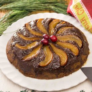 With sweet pears and spicy gingerbread, this Pear Gingerbread Upside-Down Cake is a perfect holiday, or any day, dessert.  Serve it plain or with ice cream and caramel!  