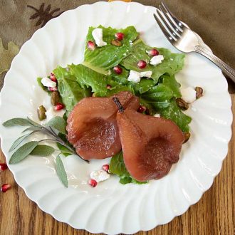 Pears, poached in red wine and cinnamon, add a festive touch to a Poached Pear Salad topped with goat cheese, pistachio nuts and pomegranate seeds.
