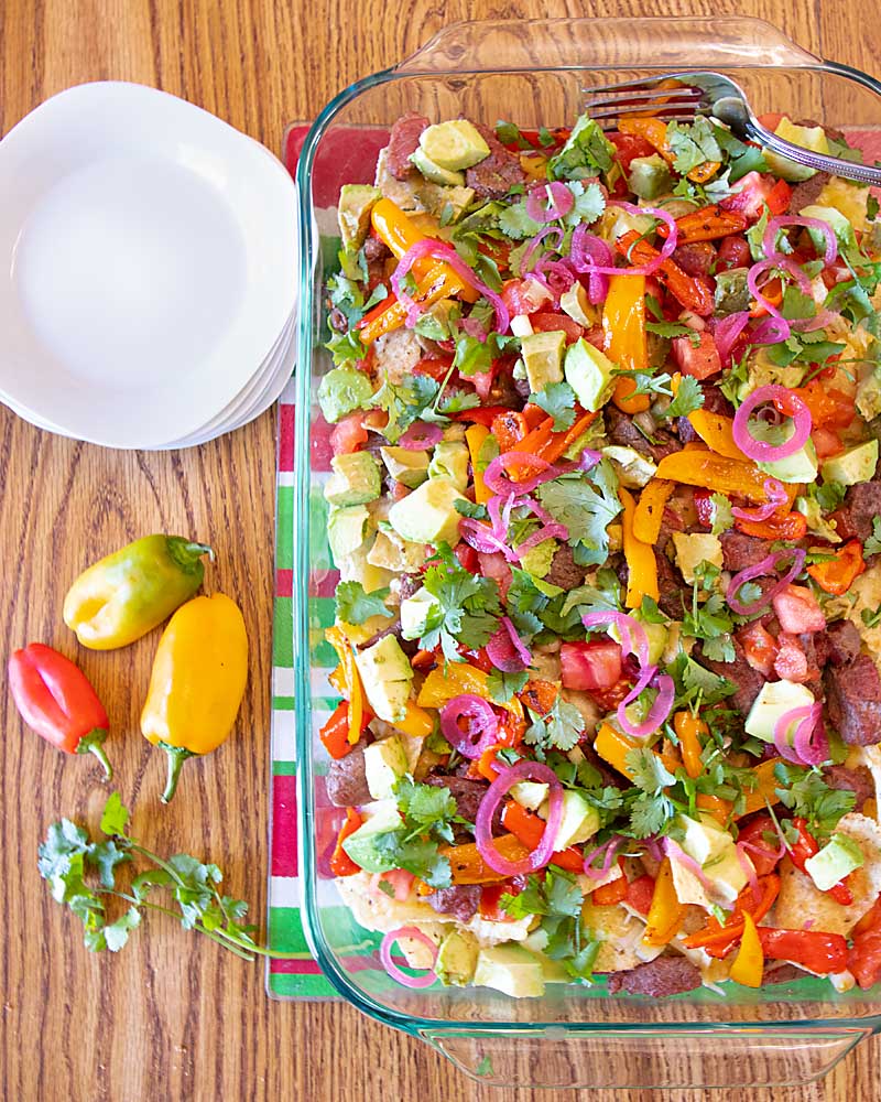 Spiff up your football snacking or just make the most fun dinner ever with these Steak Fajita Nachos.  A crowd pleaser that's ready in minutes! 