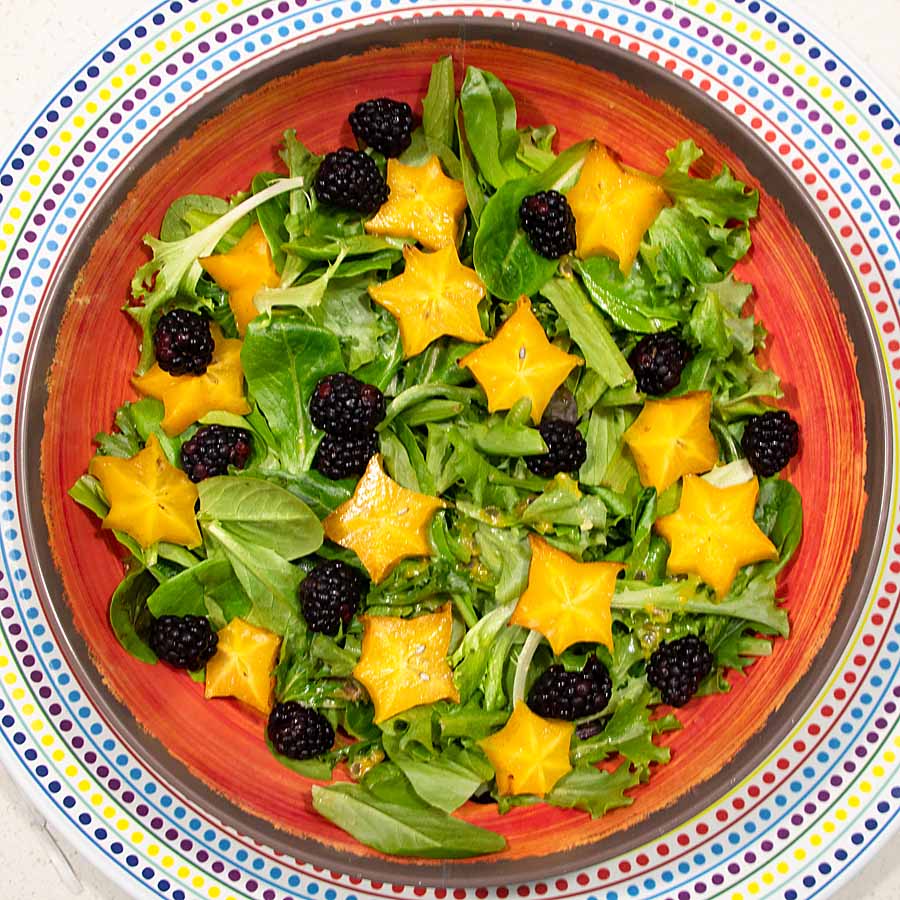 Blackberries, starfruit and salad greens pair with fresh passion fruit dressing in this tasty Moon and Starfruit Salad.