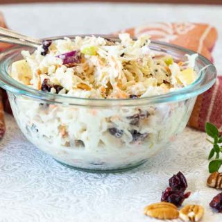 With a sweet tart creaminess, this Apple Cranberry Coleslaw is a delicious side dish to take you into fall.