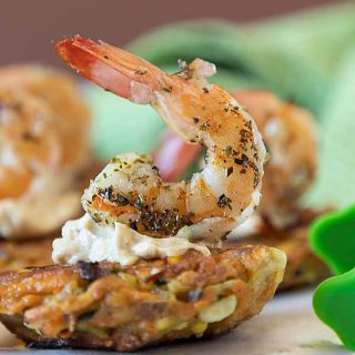 Grilled shrimp & aioli on a golden vegetable fritter makes Harvest Vegetable Fritters with Shrimp a classy Farm to Table appetizer or entrée.