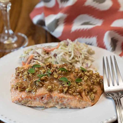 Quick and easy, this oven-roasted Honey Dijon Pecan Salmon brings together classic flavors in an entrée perfect for weekday or weekend.