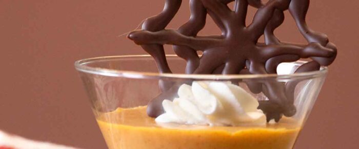 Pumpkin Pudding with Chocolate Spider Webs