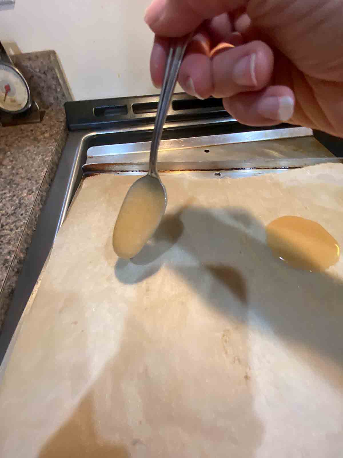 Drop spoonfuls on parchment lined baking sheeet