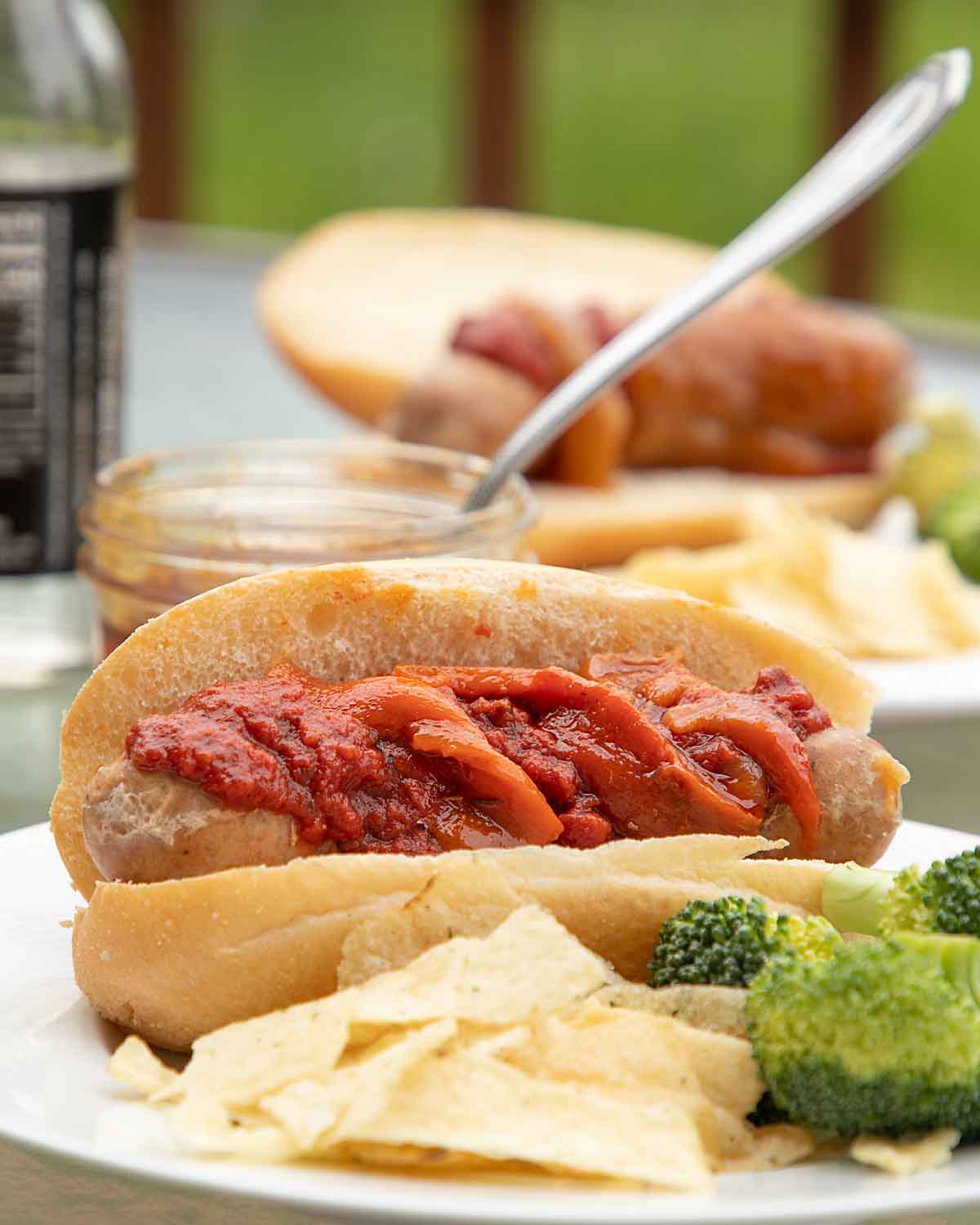 Italian Sausage Sandwiches are delicious topped with pizza sauce and peppers. And super easy, whether you go with commercial sausages or homemade.