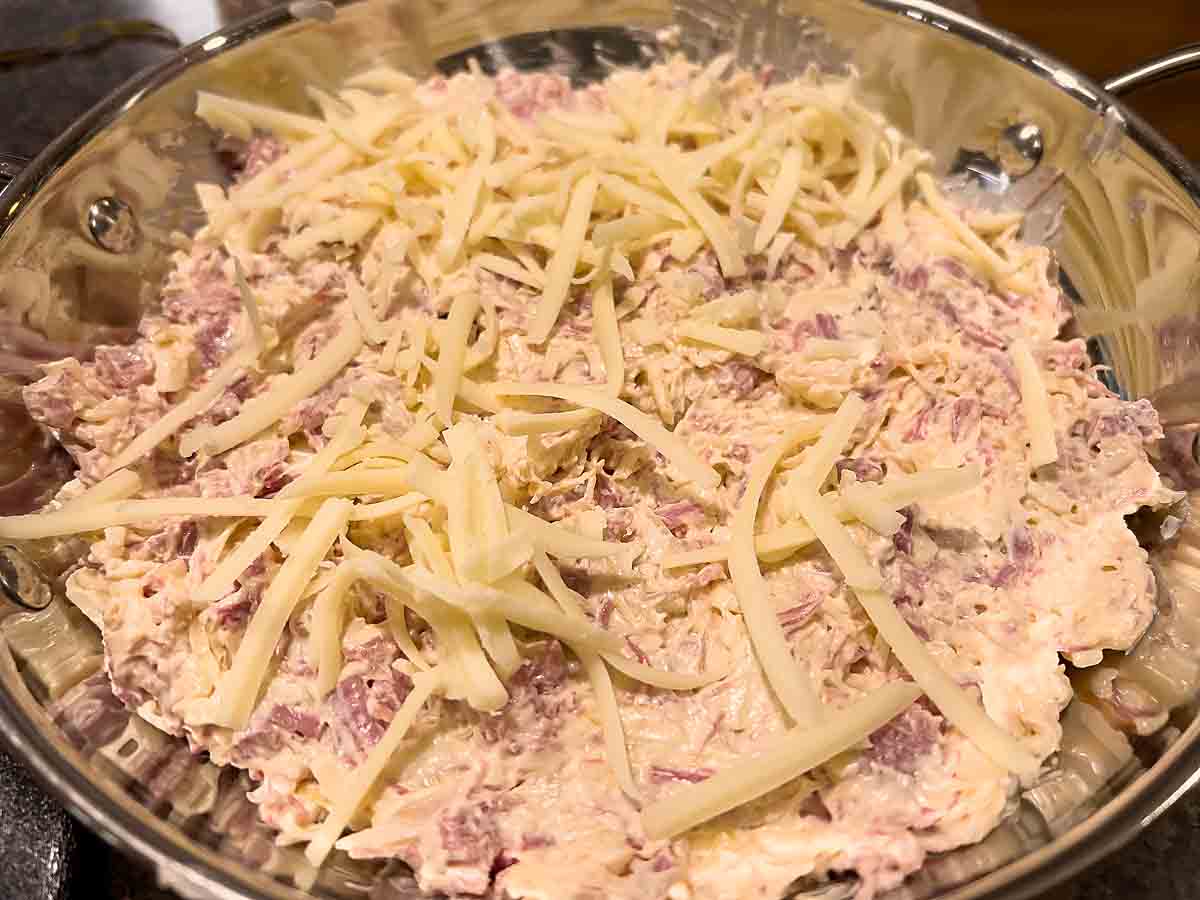 put in baking dish and top with cheese