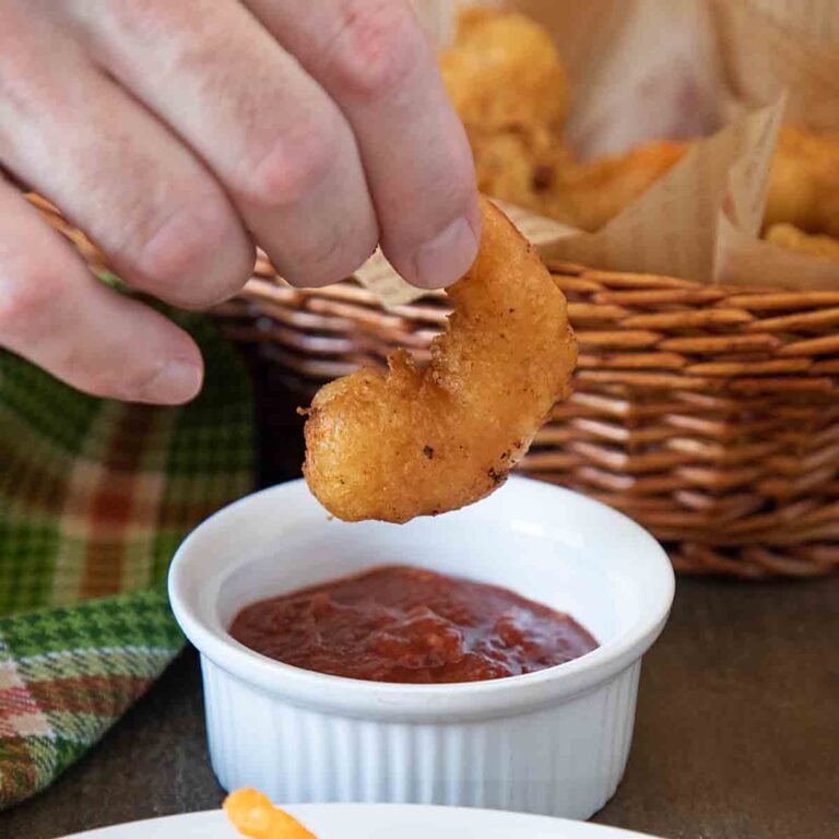 Dipping a beer battered shrimp