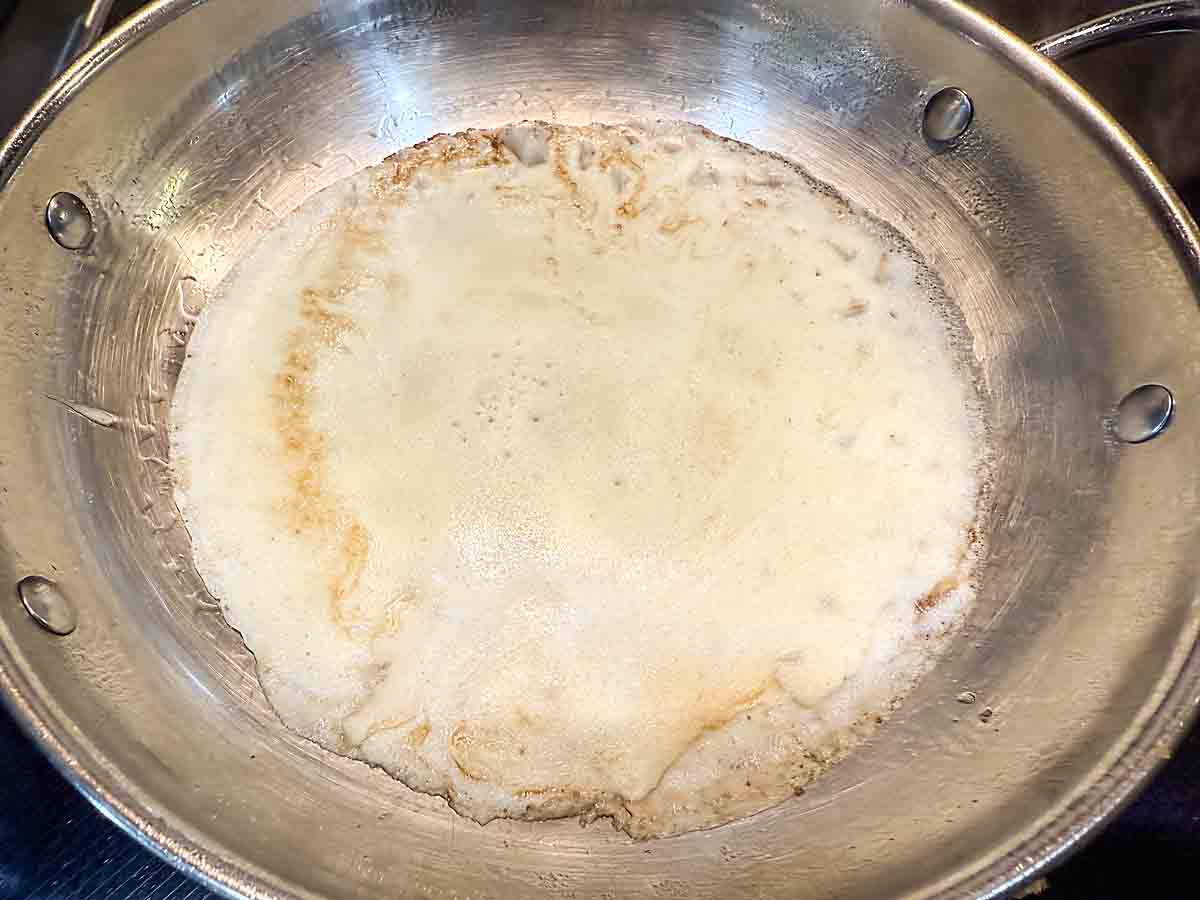 Cook first side of crepe