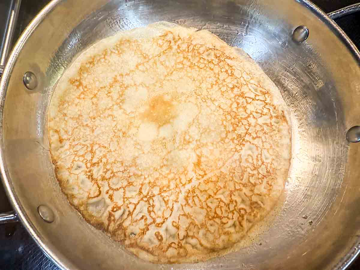 Fry crepes in pan