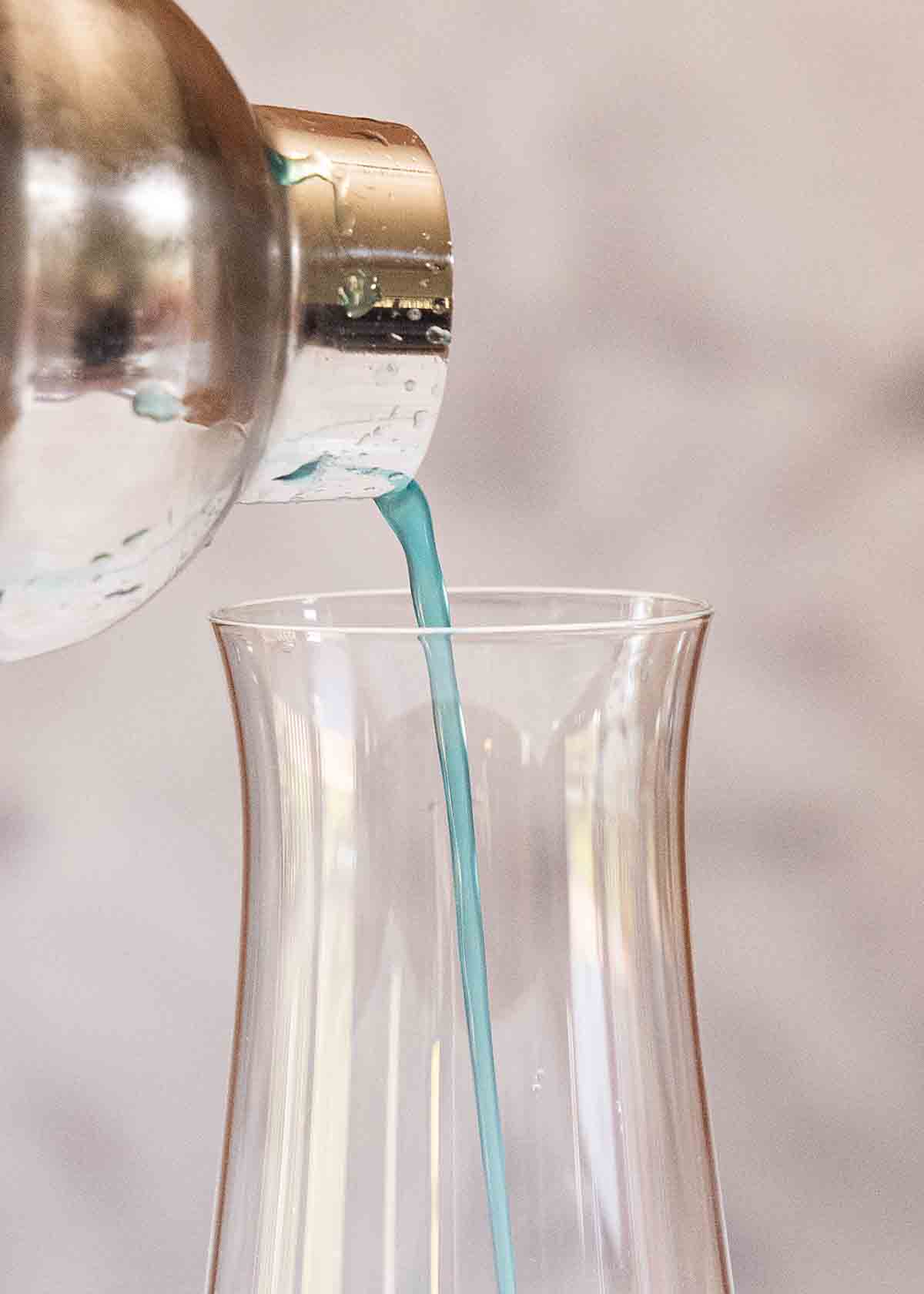 pouring cocktail