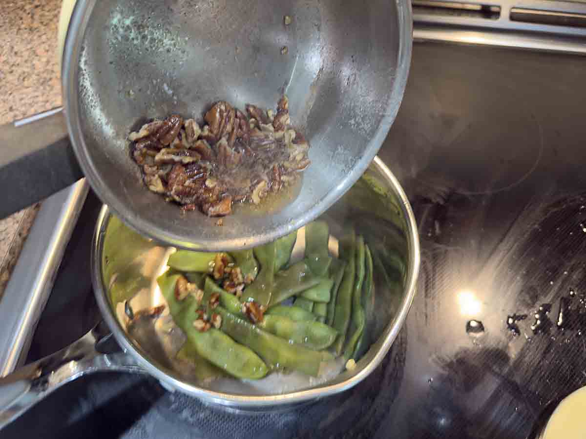 pour nuts and butter over beans