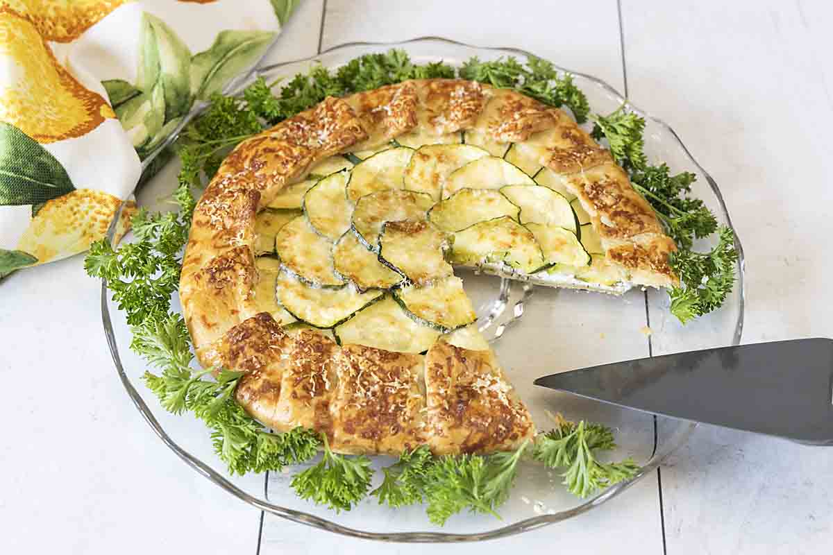 ZUcchini galette with a slice missing
