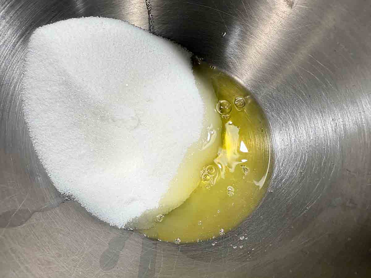 combine sugar eggs water