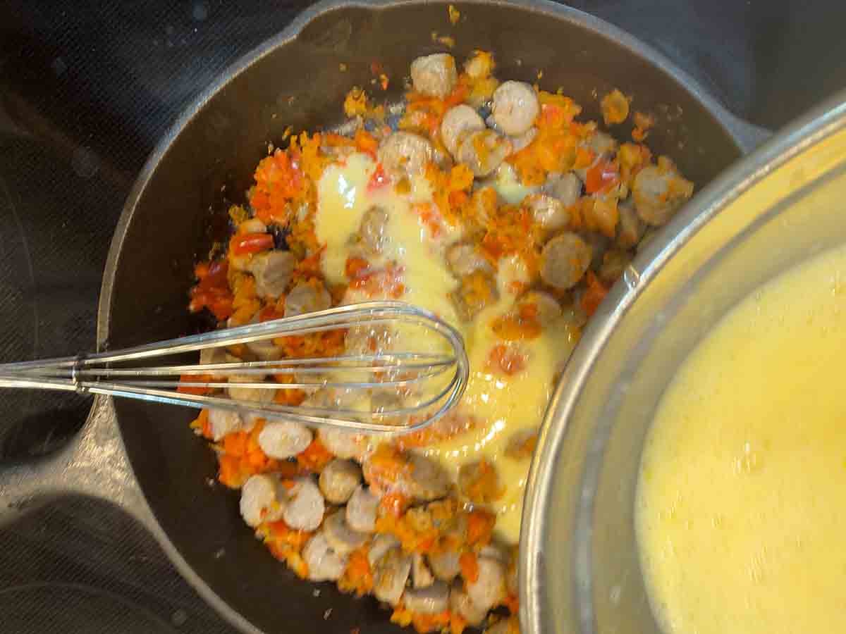 add egg to sausage and vegetable mixture