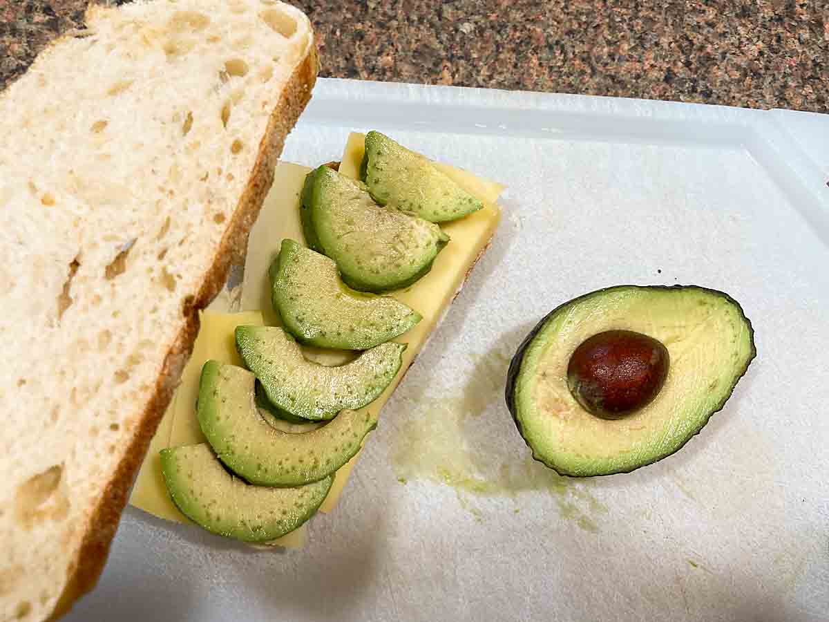 top with cheese and avocado