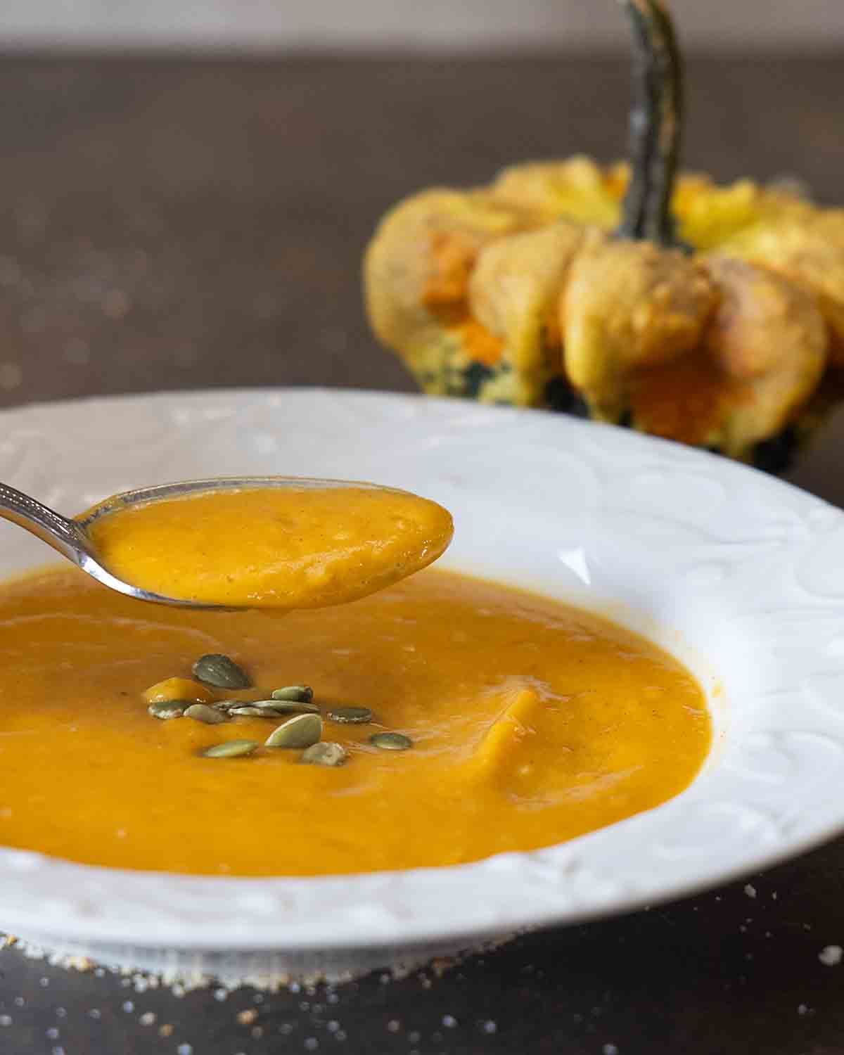 a bite of Creamy Sweet Potato Soup